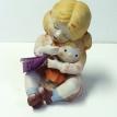 #BJ16-7 IN.LG.PIANO GIRL DOLL HOLDING A BABY $40.00