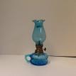 #CB8-17-COLONIAL (AZURE) BLUE CUP OIL LAMP W- BLUE SHADE 7 3-4 IN. HIGH  $19.95.